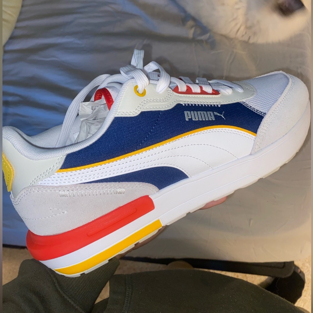 Puma running shoes Size 10 Colors: White, Blue, Yellow, Red